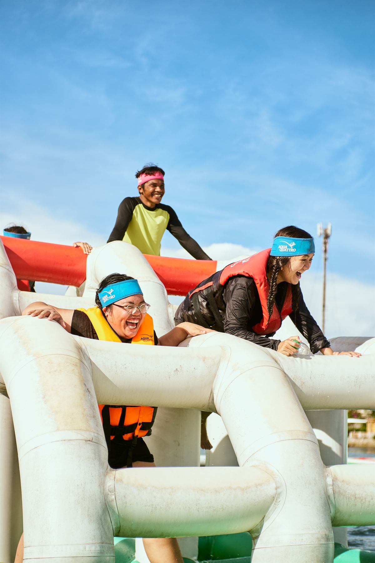 Kids on a big inflatable water slide