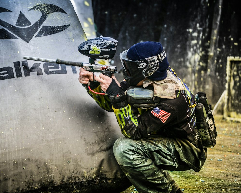 Paintball player taking aim